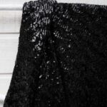 Au mètre tissu sequins noirs brillants en 135cm n°10491
