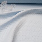 Au mètre Jersey Coton ajouré triple épaisseur rose pâle en 160cm n°10716