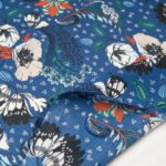 Au mètre crêpe polyester bleu motif floral beige et bleu n°10795