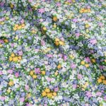 Au mètre coton imprimé  fleurette moutarde et verte en 145cm n°11057