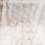 Au mètre dentelle stretch Polyester polyamide  fleur blanc cassé n°11099