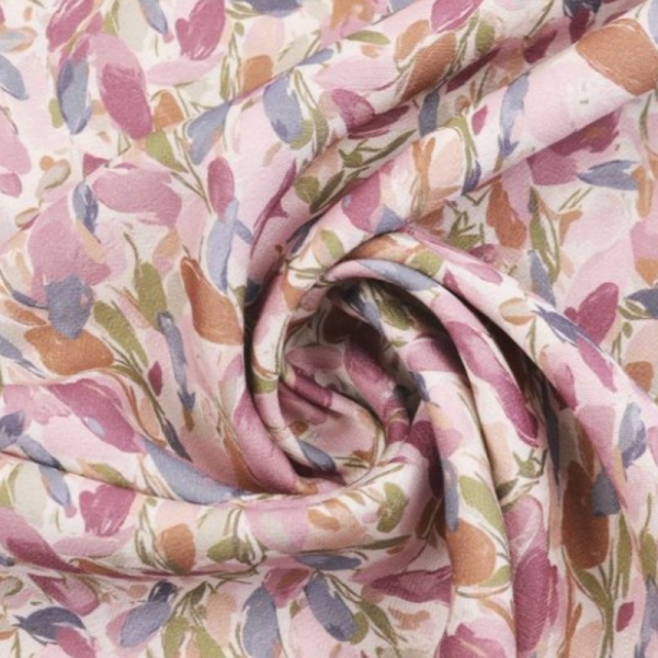 Crêpe Viscose motif petites feuilles fond mauve