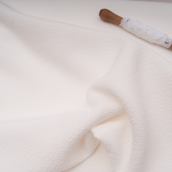 belle étoffe de qualité, crêpe polyester texturé Blanc cassé