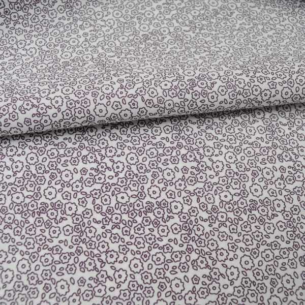 Coton Haute Couture fond blanc cassé à fleurettes mauves