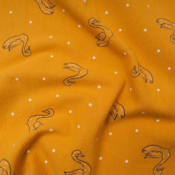 coton lavé motif cygne avec pois blancs fond OCRE Oekotex