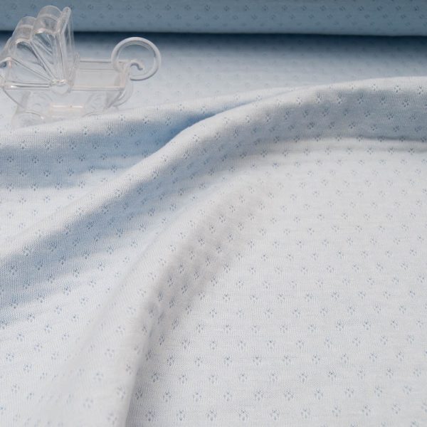 Jersey Coton ajouré double épaisseur bleu layette