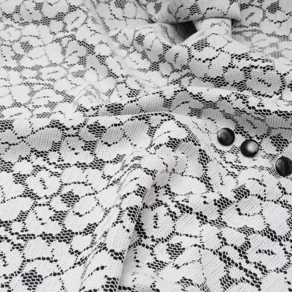 Jersey noir avec dentelle blanc cassé contrecollée
