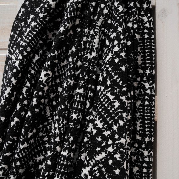 Maille gaufrée fantaisie noir et blanc
