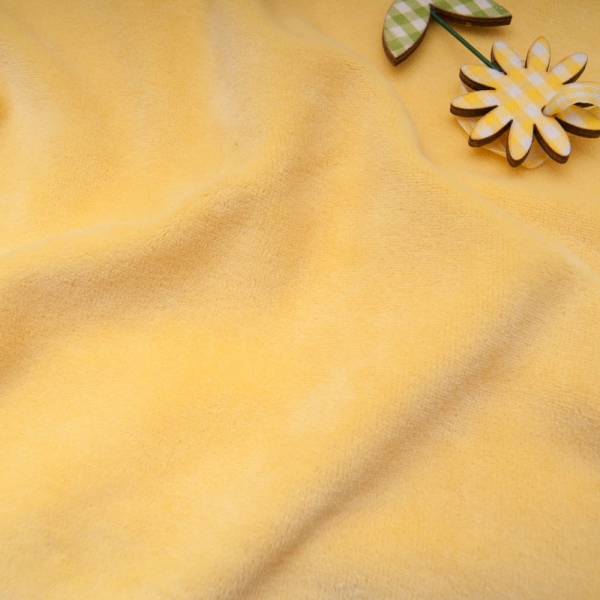 tissu doudou, un beau JAUNE poussin Polyester