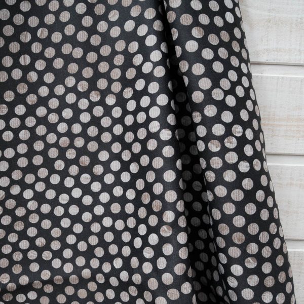 Coupon Ameublement Toile Polyester "Pois beiges" fond noir 1m