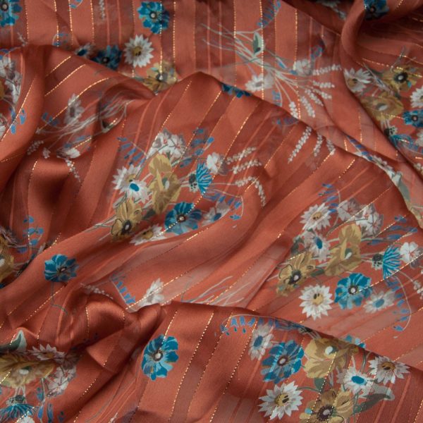 Coupon Mousseline polyester rouille fleurie à rayure lurex dorée 1m90