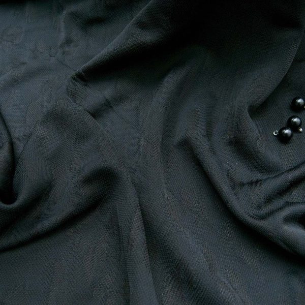Maille Viscose noire ajourée fond graou léopard