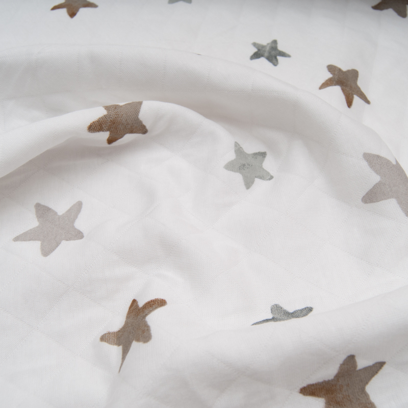 jersey coton matelassé imprimé étoile taupe fond blanc