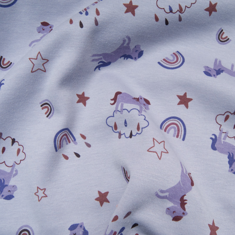 Tissu sweat, envers polaire moelleux couleur LILA motif Licorne