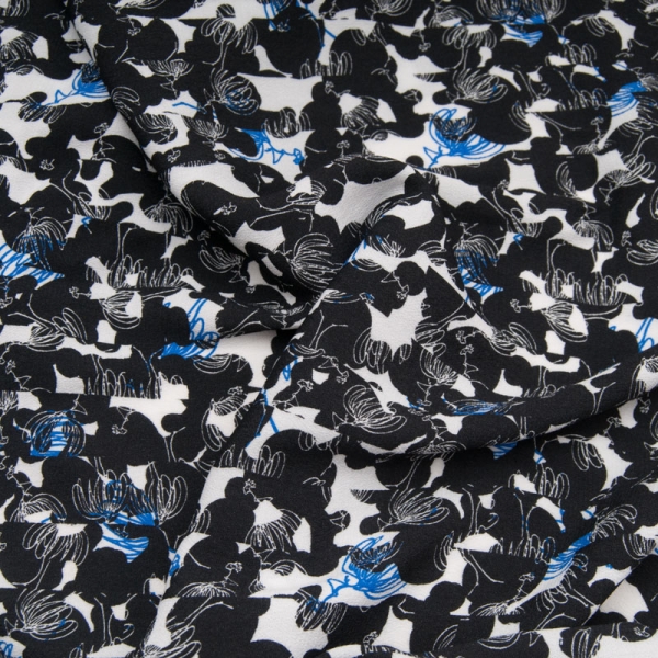Crêpe viscose, souple en noir et blanc touche de bleu roi