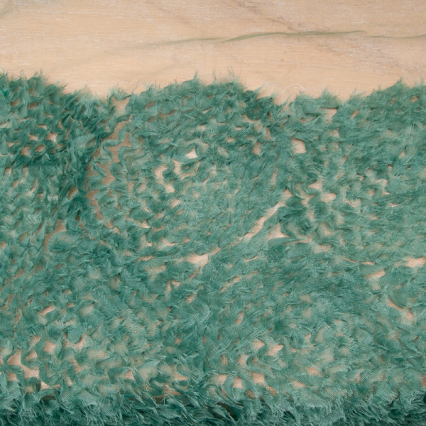 tissu fantaisie polyester festonné effet 3D en VERT