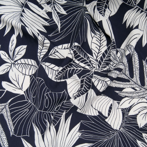 Viscose Motif grande feuille blanche tropicale sur fond bleu marine