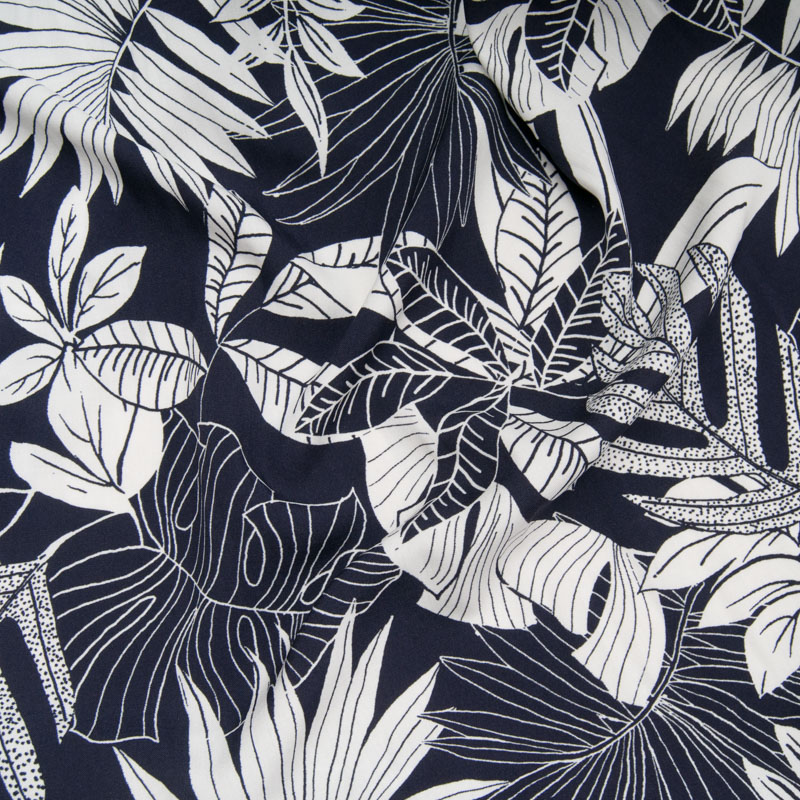 Viscose Motif grande feuille blanche tropicale sur fond bleu marine