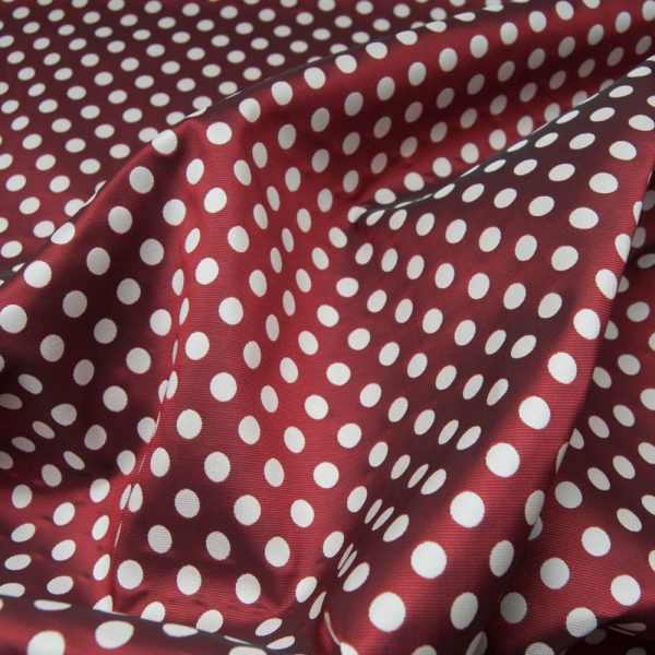 Tissu jacquard polyester groseille à pois beige réversible