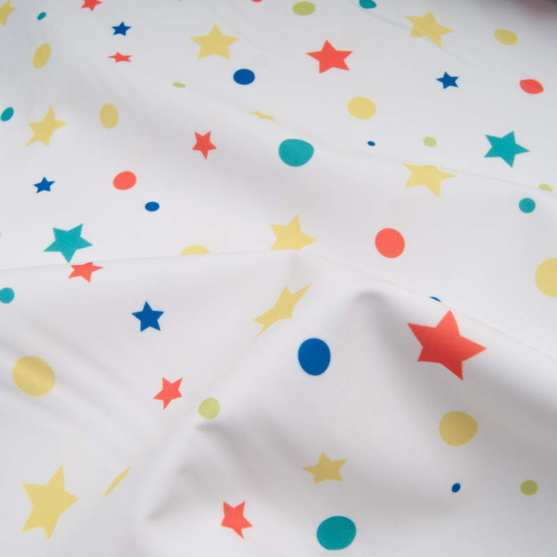 Tissu Softshell envers polaire imprimé "Pois Etoiles" fond blanc" Ref 11183F11