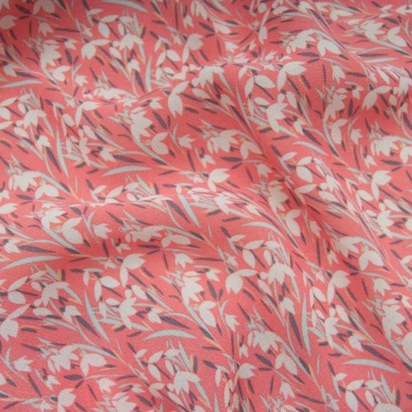 Tissu Voile crêpe Viscose corail motif floral