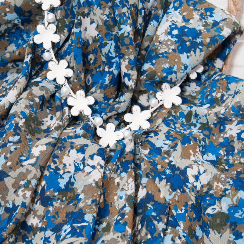 Tissu crêpe voile viscose fleurettes en kaki et bleu roi